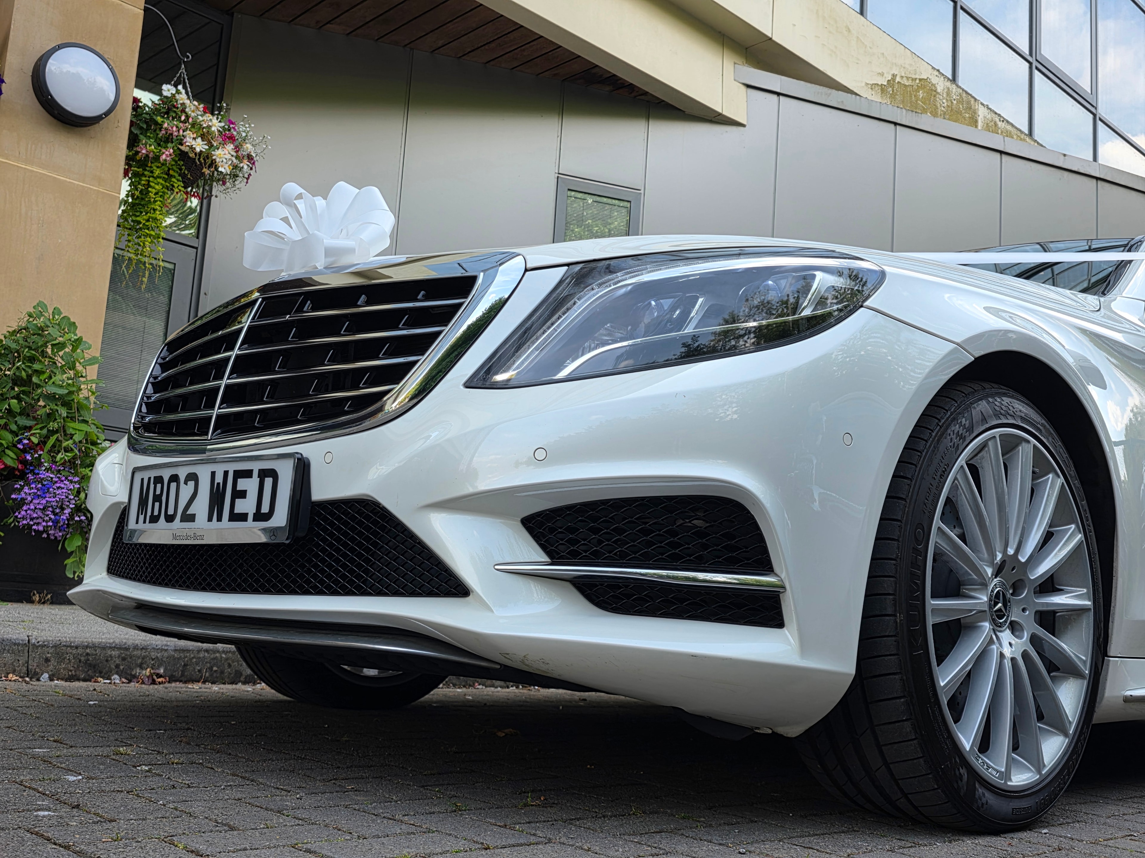 White prestige wedding car